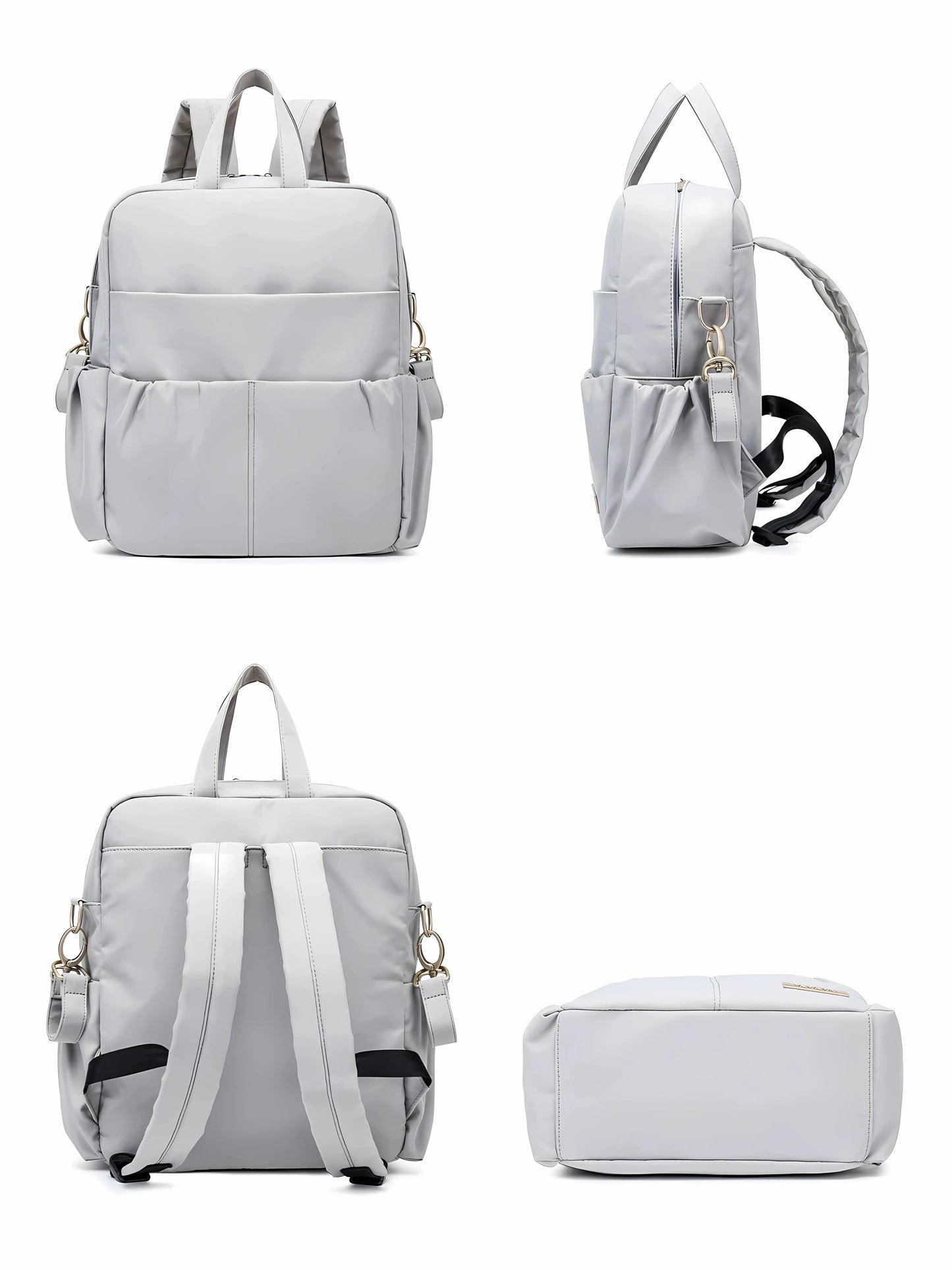 Vue complète d’un sac à langer gris multifonction, avec plusieurs poches et bretelles réglables, idéal pour les parents en déplacement.