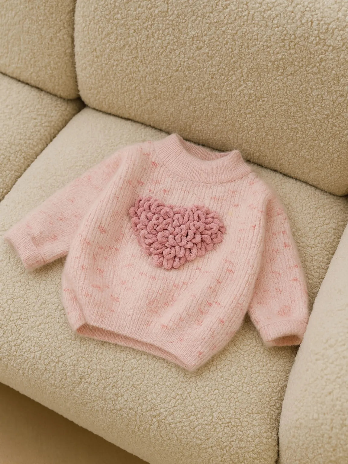 Heart-shaped knitted sweater