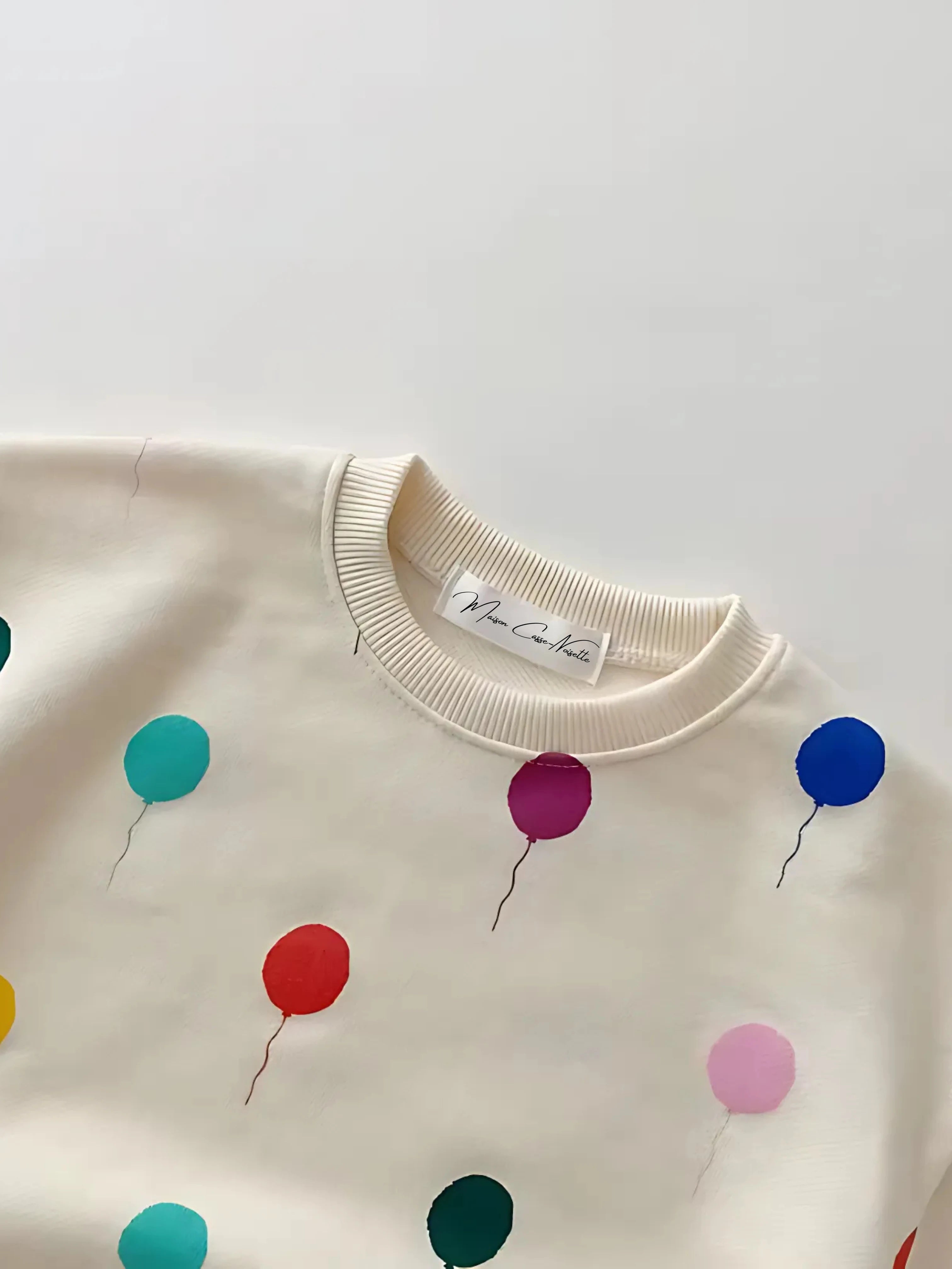 Néo - Son ensemble sweat-shirt et pantalon imprimé ballons multicolores